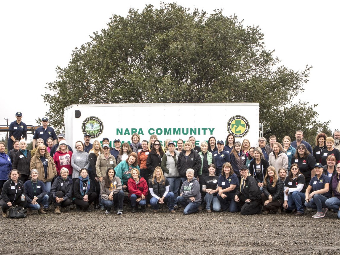 Group photo at Napa Community event outdoors.